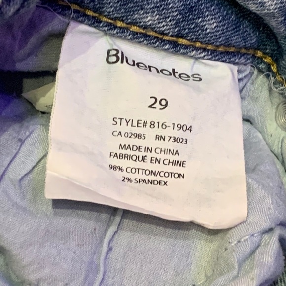 ripped blue jeans - Picture 2 of 2